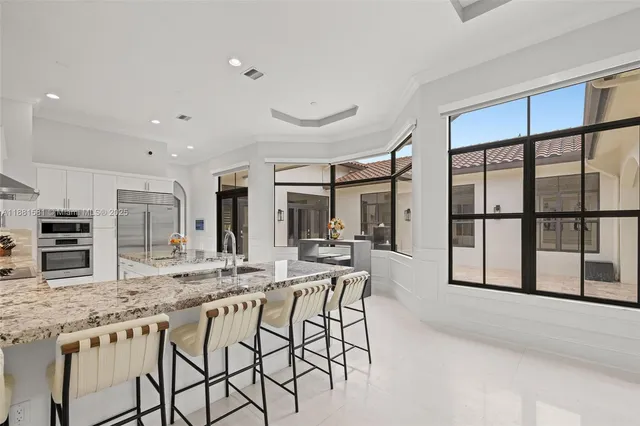 $2,625,000 | 10501 North Camelot Circle, Davie, FL 33328