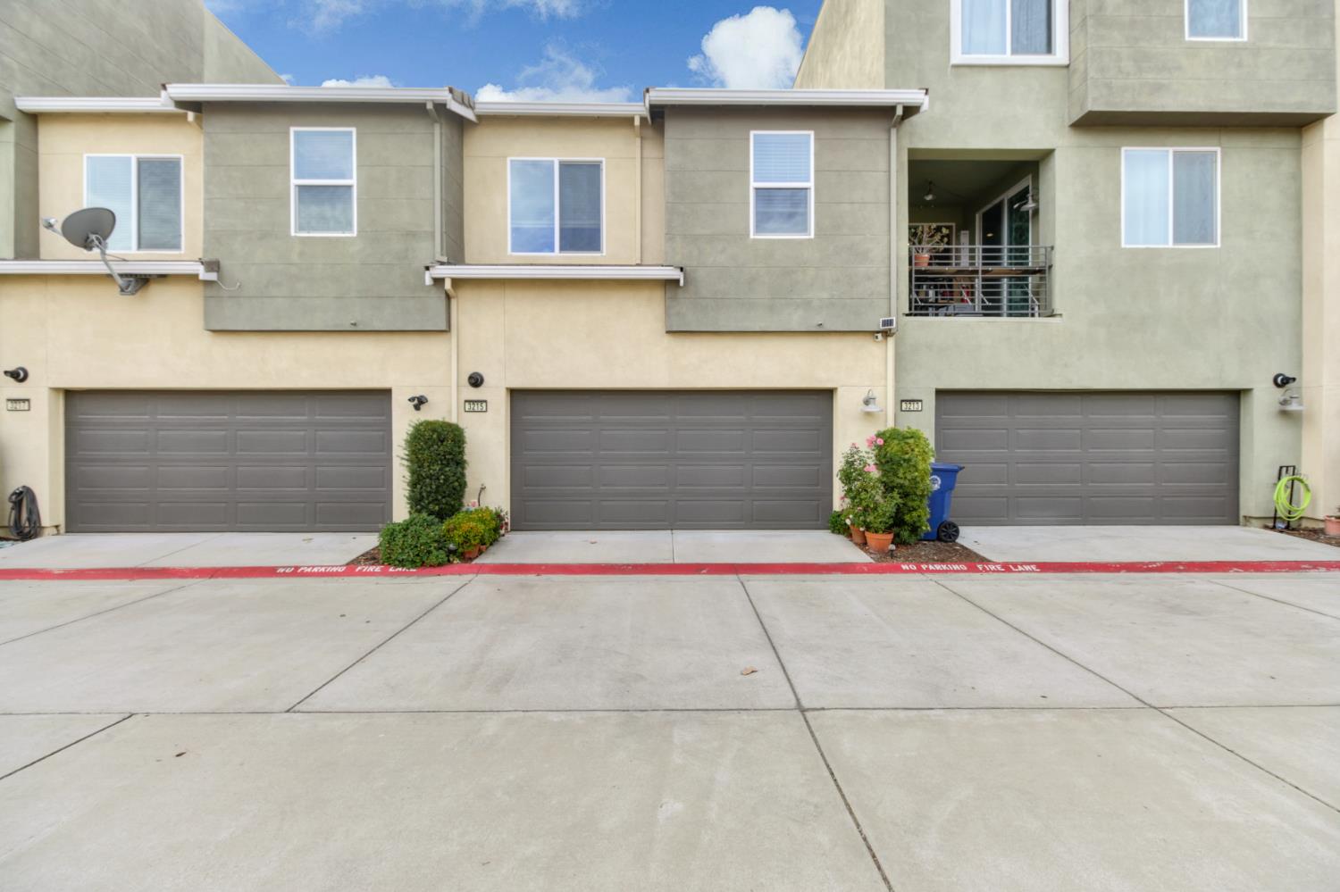 3215 Bridgeway Drive Rancho Cordova, CA 95670 - Photo 29 of 32 a front view of a house with garage and plants