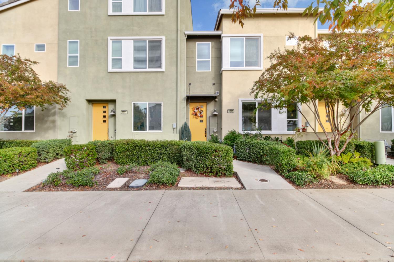 3215 Bridgeway Drive Rancho Cordova, CA 95670 - Photo 31 of 32 front view of a brick house with a yard