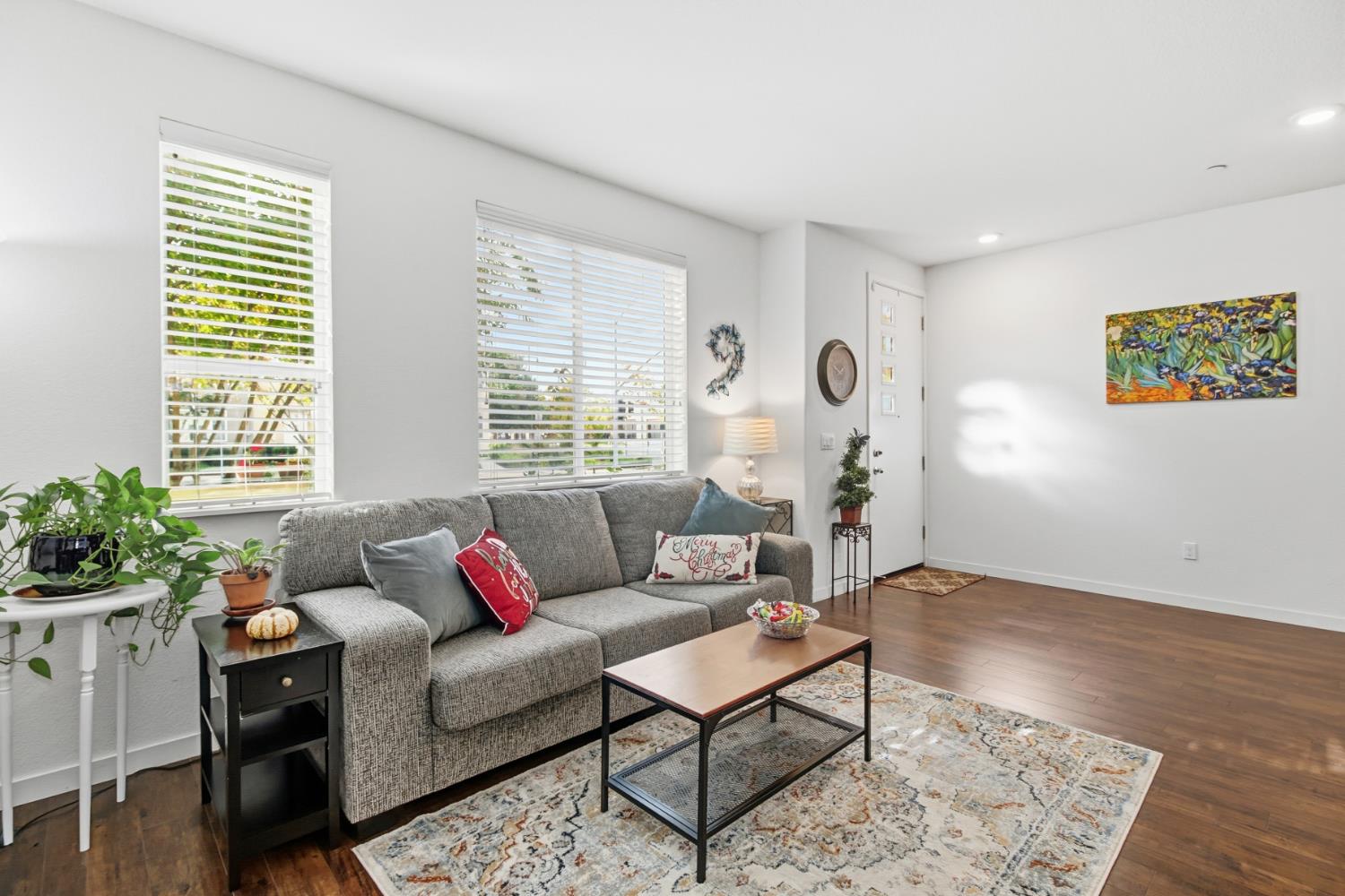 3215 Bridgeway Drive Rancho Cordova, CA 95670 - Photo 6 of 32 a living room with furniture and a large window