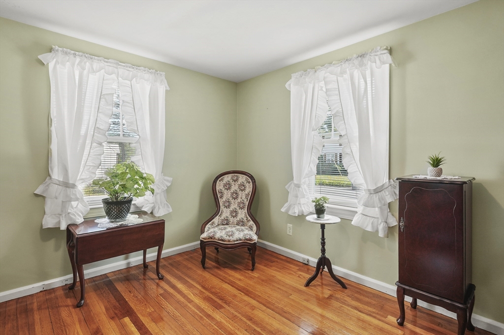 305 Whalom Road Lunenburg, MA 01462 - Photo 17 of 29 a living room with furniture and a window