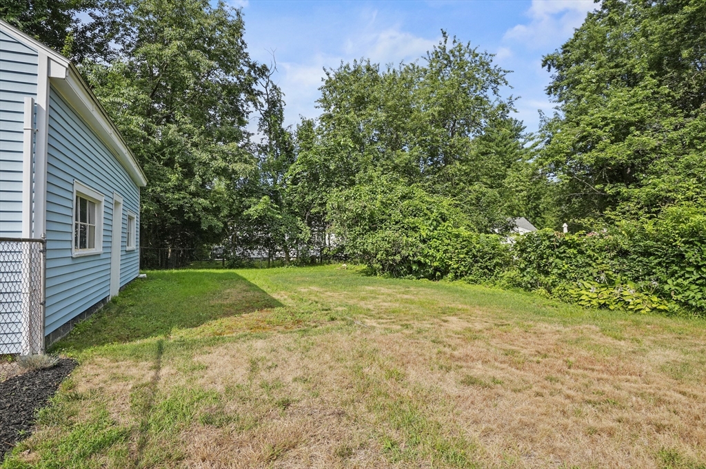 305 Whalom Road Lunenburg, MA 01462 - Photo 29 of 29 a view of backyard with green space