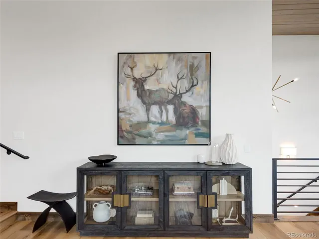 a view of a livingroom with furniture and wooden floor