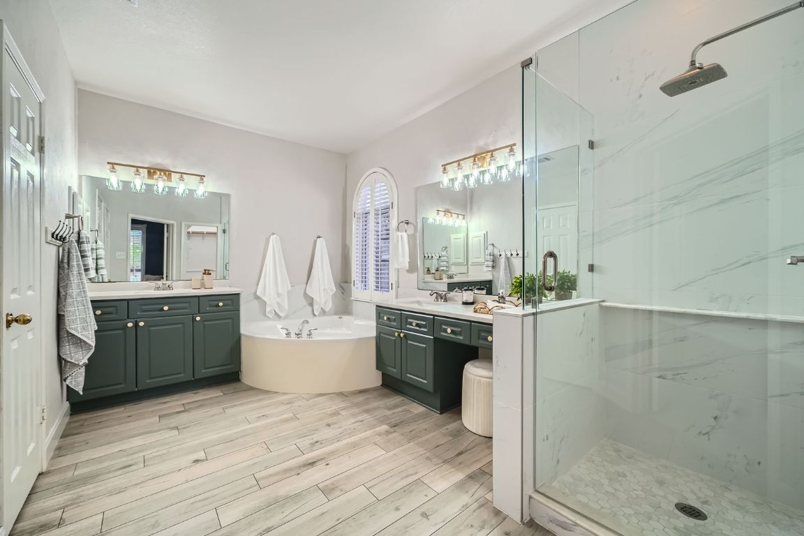1237 Fall Creek Loop Cedar Park, TX 78613 - Photo 20 of 39 a large kitchen with kitchen island a sink stainless steel appliances and cabinets