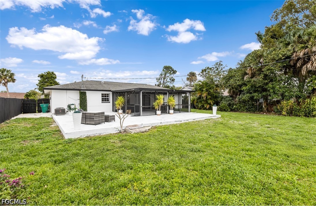 3950 Mohawk Place Naples, FL 34112 - Photo 24 of 25 a view of house with yard and sitting area
