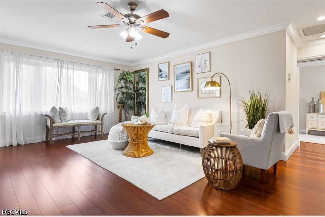 3950 Mohawk Place Naples, FL 34112 - Photo 5 of 25 a living room with furniture and wooden floor