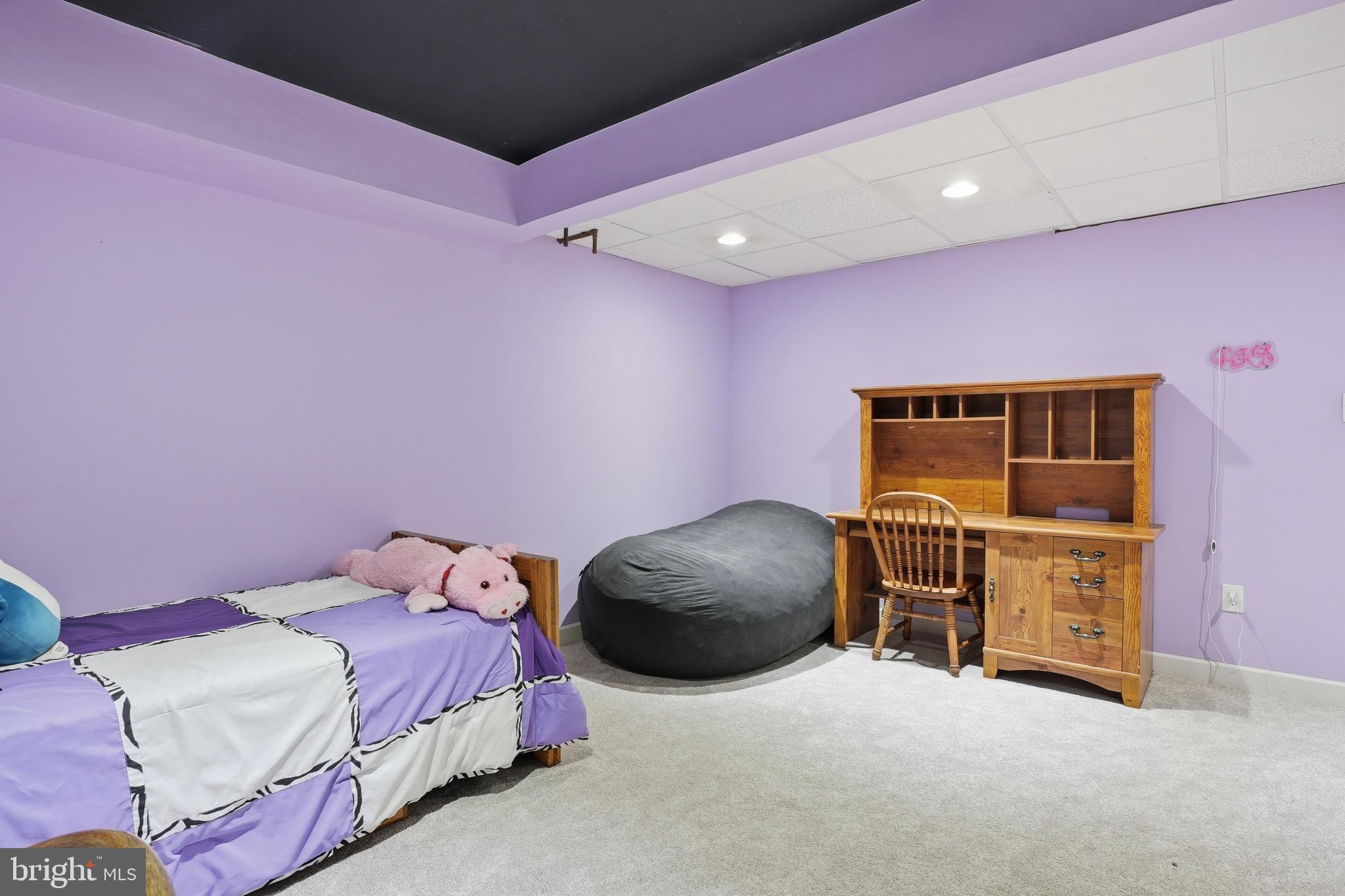 6118 Fishers Station Road Lothian, MD 20711 - Photo 39 of 62 a bedroom with a bed and cabinets
