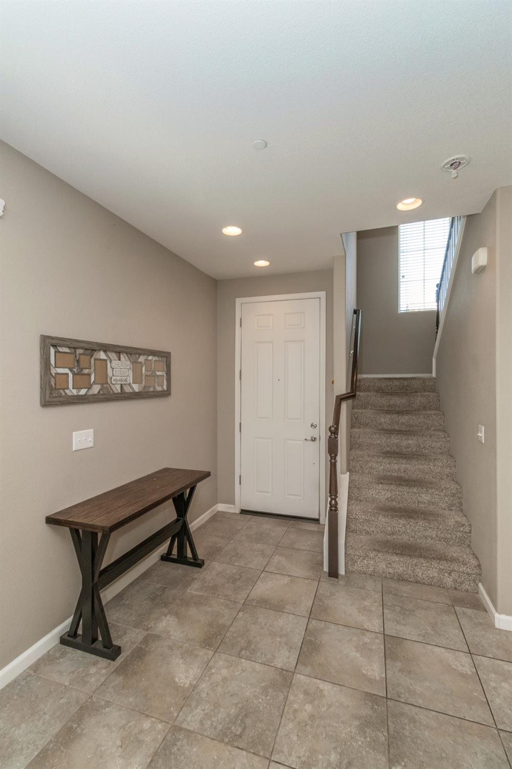 3263 Monviso Lane Clovis, CA 93619 - Photo 12 of 30 a view of a hallway with stairs