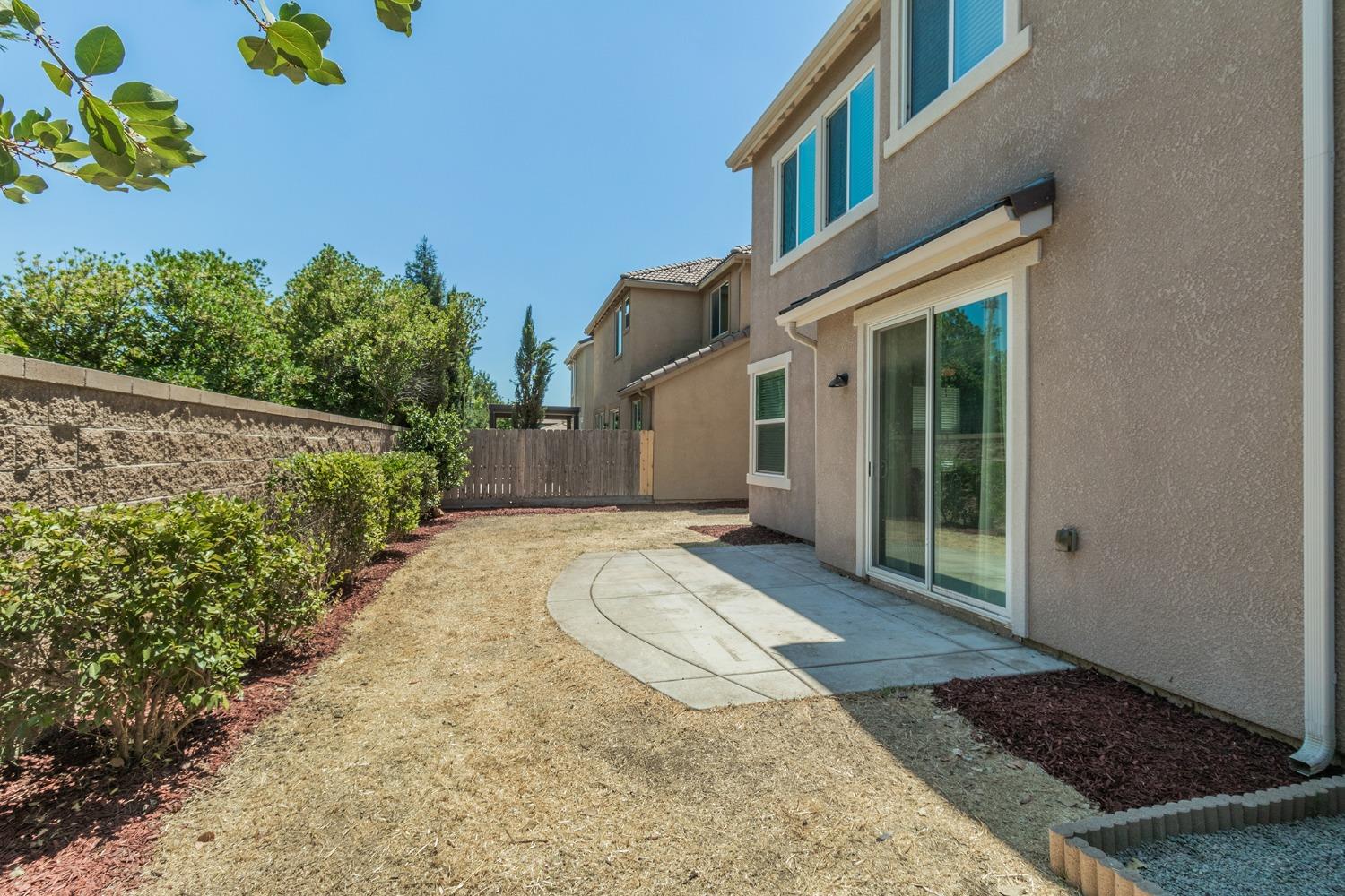 3263 Monviso Lane Clovis, CA 93619 - Photo 23 of 30 a view of a house with a yard
