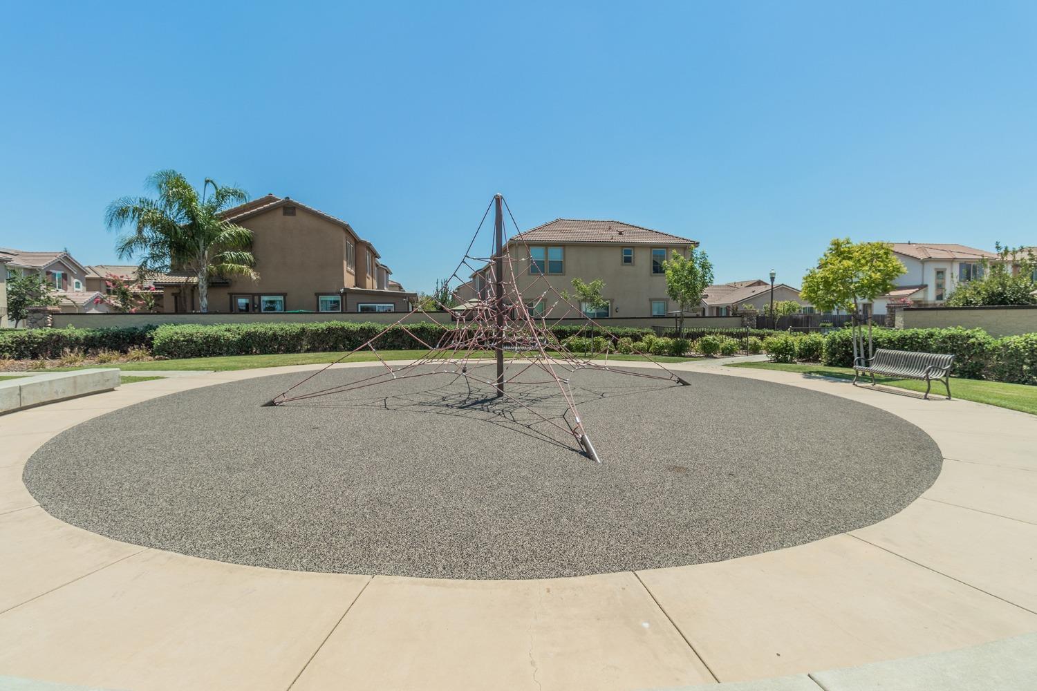 3263 Monviso Lane Clovis, CA 93619 - Photo 27 of 30 a view of a swimming pool with a yard
