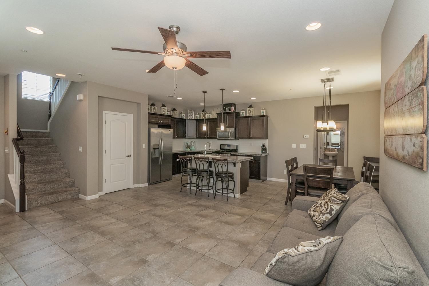 3263 Monviso Lane Clovis, CA 93619 - Photo 4 of 30 a living room with furniture and kitchen view