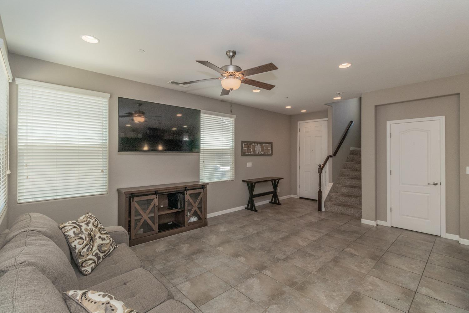 3263 Monviso Lane Clovis, CA 93619 - Photo 5 of 30 a living room with furniture and a flat screen tv
