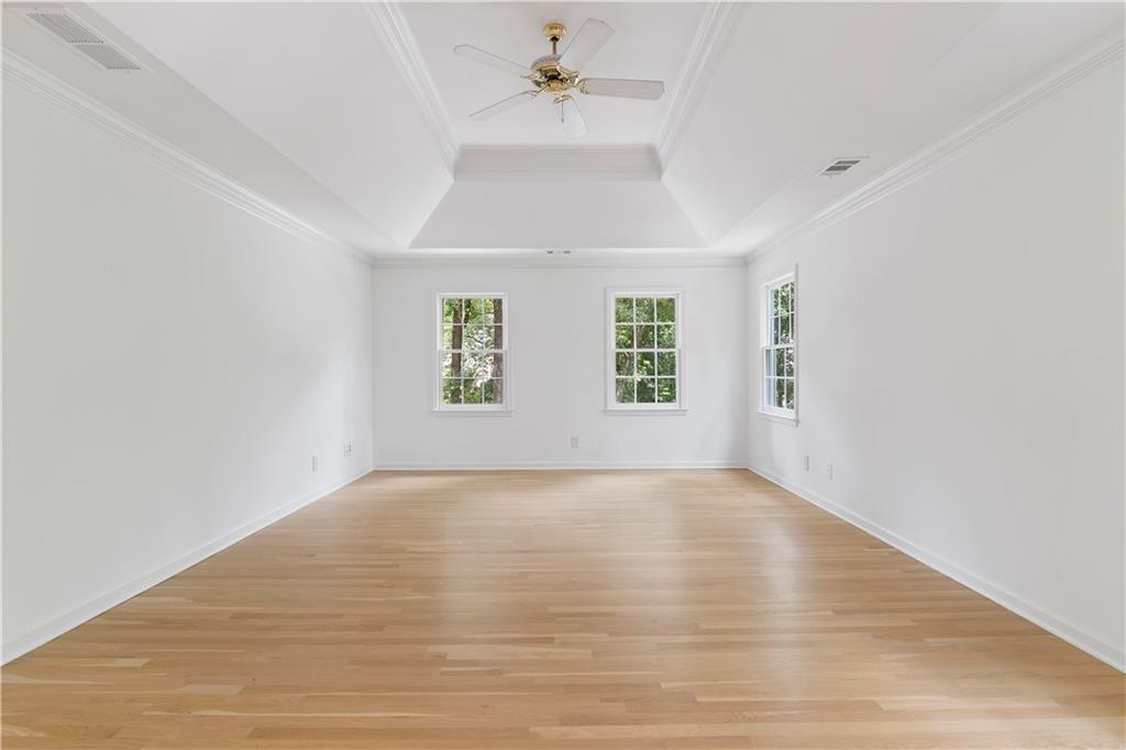 8965 Laurel Way Alpharetta, GA 30022 - Photo 30 of 79 wooden floor in an empty room with a window