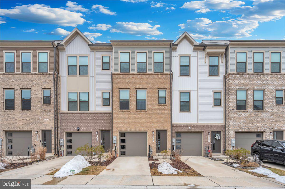3357 Cormorant Drive Laurel, MD 20724 - Photo 1 of 41 a front view of a building with a yard
