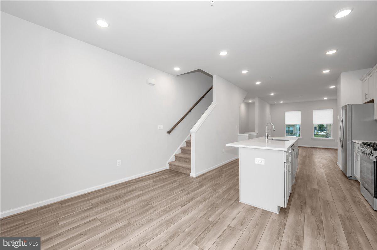 3357 Cormorant Drive Laurel, MD 20724 - Photo 20 of 41 a view of a kitchen with a sink and wooden floor