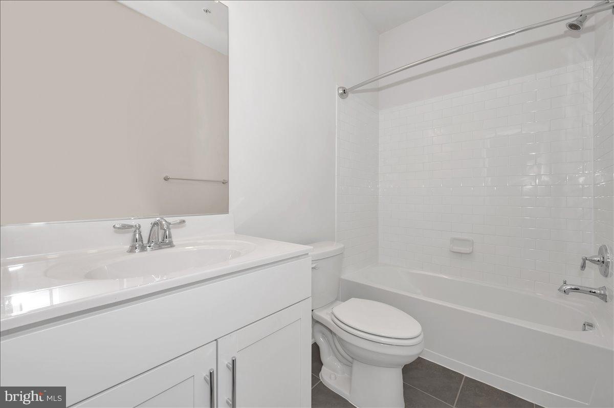 3357 Cormorant Drive Laurel, MD 20724 - Photo 39 of 41 a bathroom with a sink a toilet and a bathtub