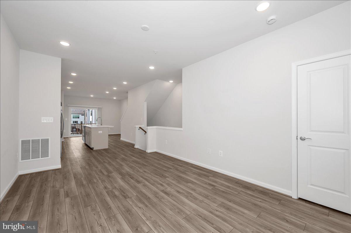 3357 Cormorant Drive Laurel, MD 20724 - Photo 6 of 41 a view of a kitchen with wooden floor and a kitchen