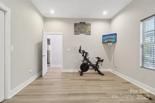 a view of a room with gym equipment