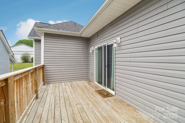 a view of deck with wooden floor and fence