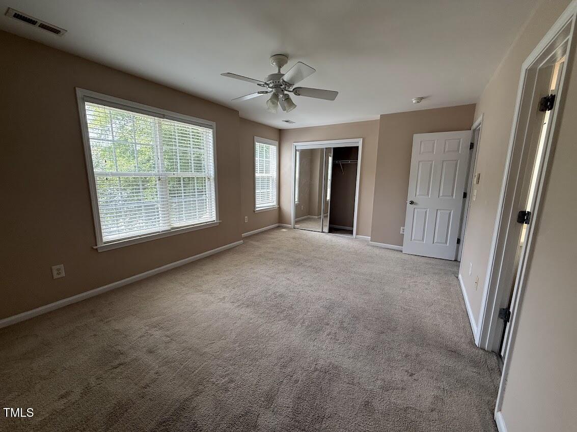 4429 Log Cabin Drive Raleigh, NC 27616 - Photo 19 of 27 a view of a livingroom with a ceiling fan and window