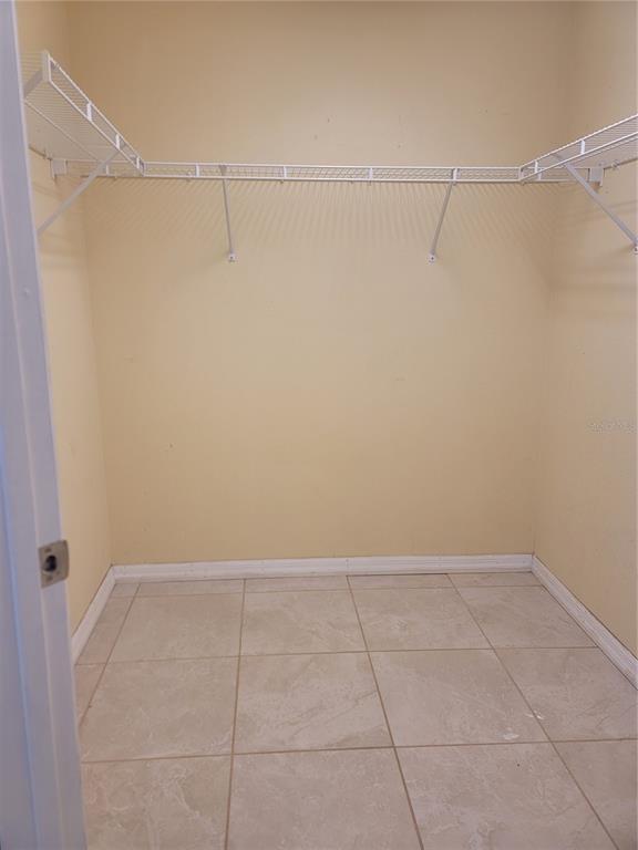 601 Astor Drive Haines City, FL 33844 - Photo 12 of 18 a view of a room with racks on the wall