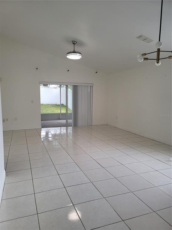 601 Astor Drive Haines City, FL 33844 - Photo 13 of 18 a view of an empty room with a window