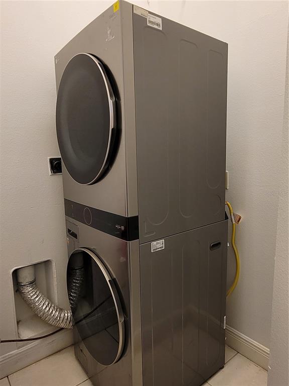 601 Astor Drive Haines City, FL 33844 - Photo 17 of 18 a utility room with dryer and washer