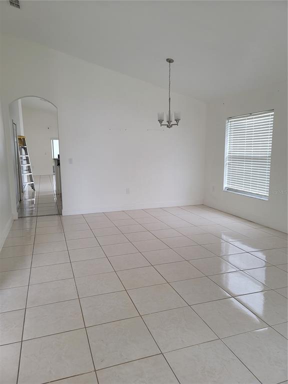 601 Astor Drive Haines City, FL 33844 - Photo 4 of 18 a view of an empty room with a window