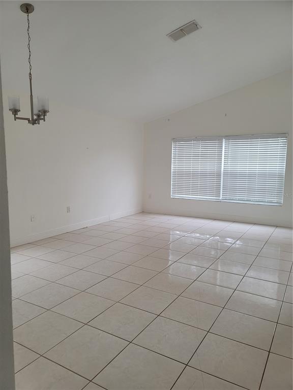 601 Astor Drive Haines City, FL 33844 - Photo 5 of 18 a view of an empty room with a window