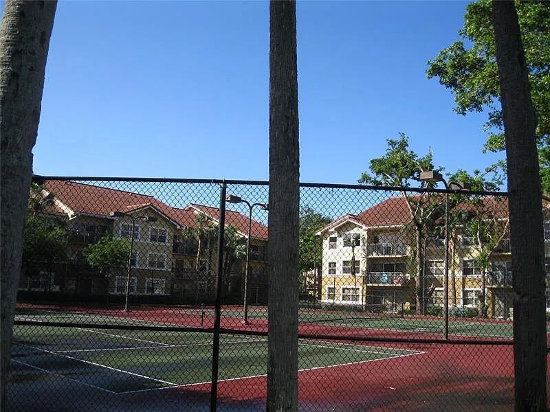 8781 Wiles Road, Unit 203 Coral Springs, FL 33067 - Photo 15 of 17 8781-tennis court