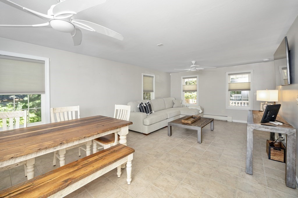 304 Mill Road Fairhaven, MA 02719 - Photo 11 of 35 a living room with furniture and a window