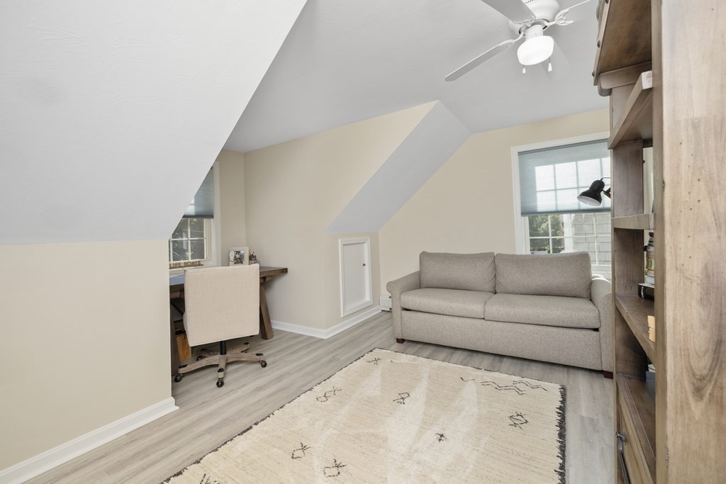 304 Mill Road Fairhaven, MA 02719 - Photo 20 of 35 a living room with furniture and a flat screen tv