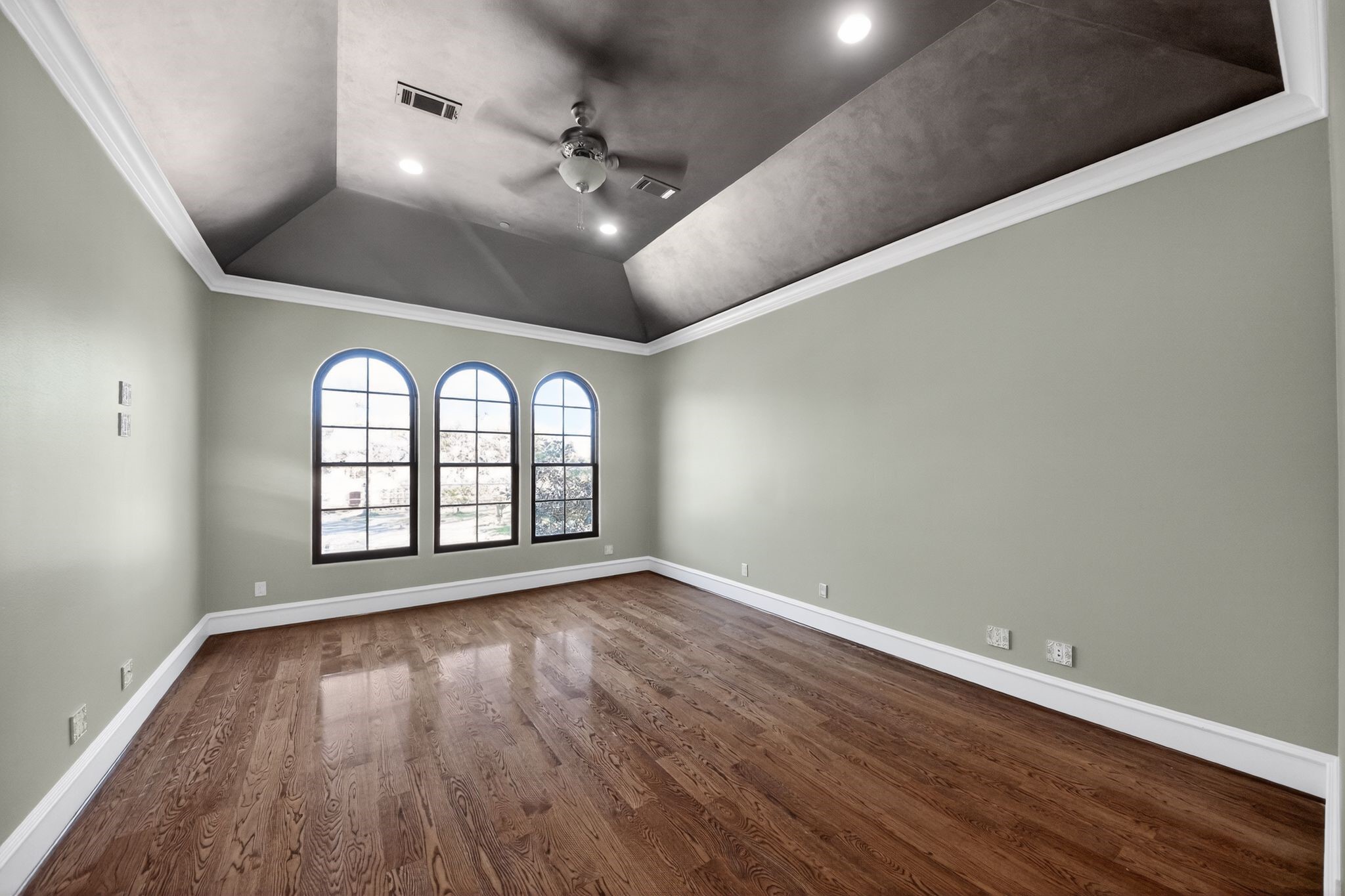 11117 Beinhorn Road Houston, TX 77024 - Photo 25 of 48 wooden floor in an empty room with a window
