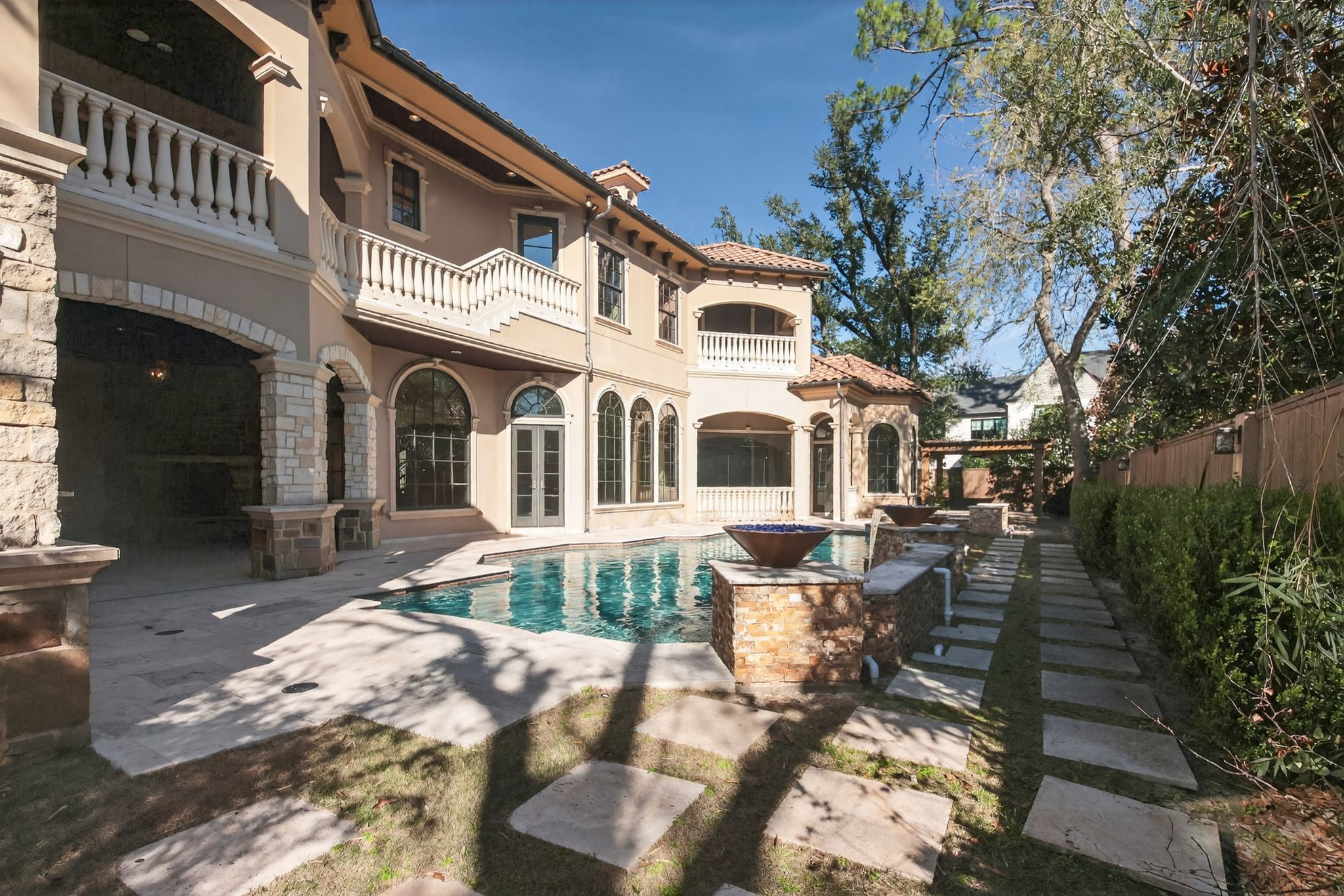 11117 Beinhorn Road Houston, TX 77024 - Photo 33 of 48 a view of a white building with many windows