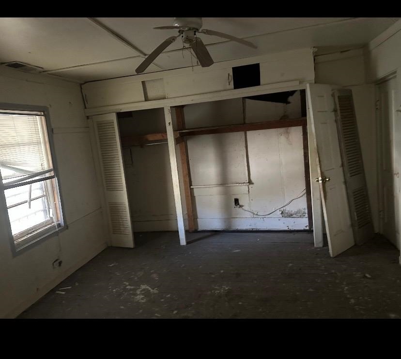 3043 Sax Road Memphis, TN 38109 - Photo 4 of 9 a view of empty room with wooden floor