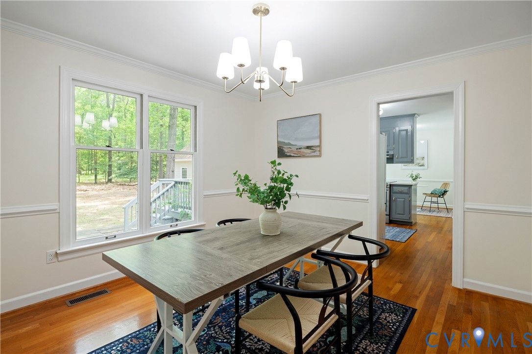 2727 River Run Road Prince George, VA 23875 - Photo 12 of 35 Formal dining room off the kitchen with a new chan