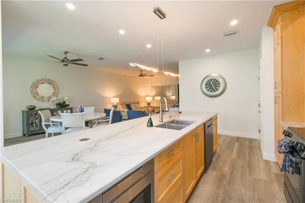 $8,000 | 5632 Whisperwood Boulevard, Unit 1601, Naples, FL 34110