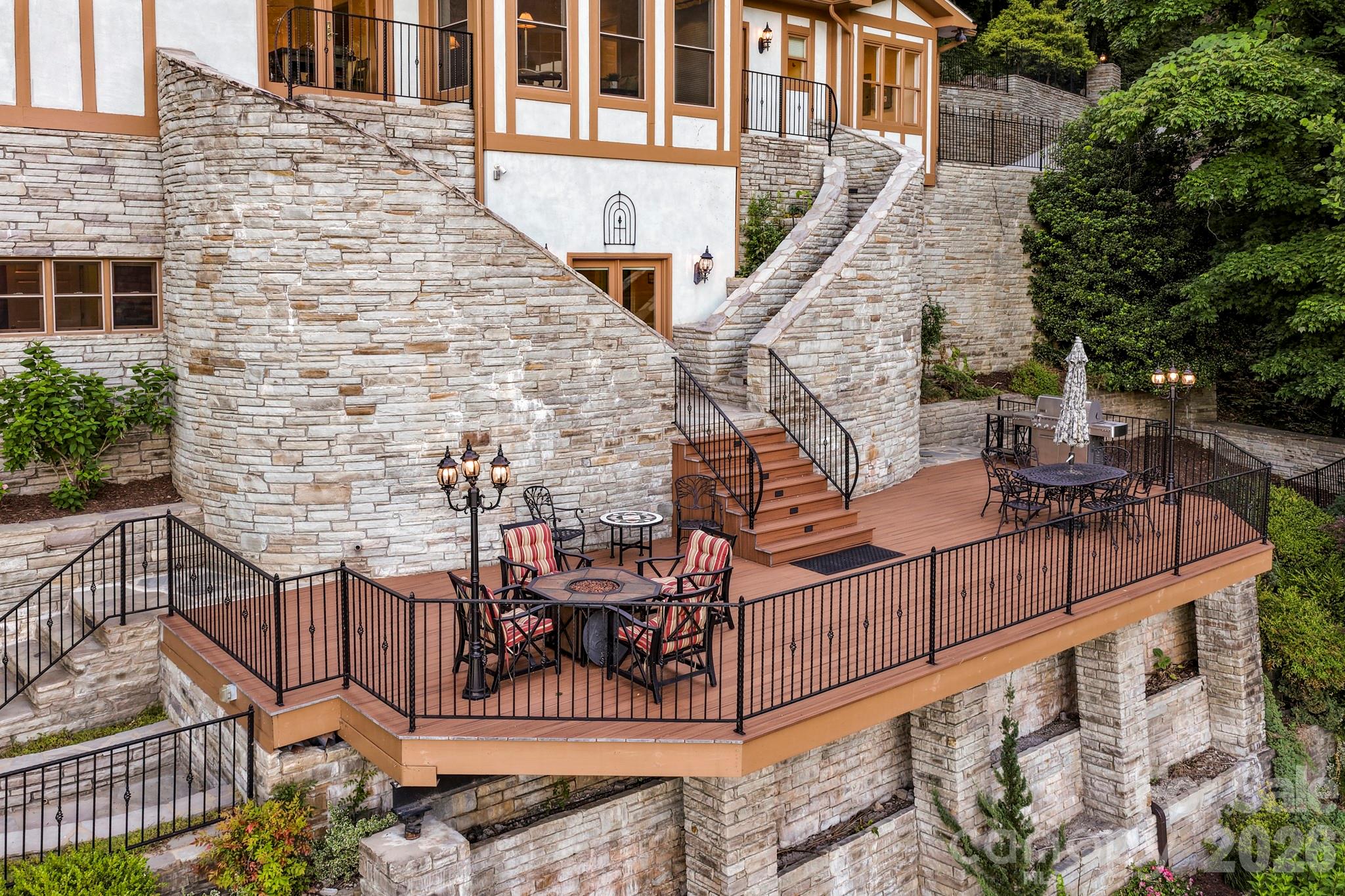 151 Garner Road Lake Lure, NC 28746 - Photo 40 of 48 a view of building with outdoor seating