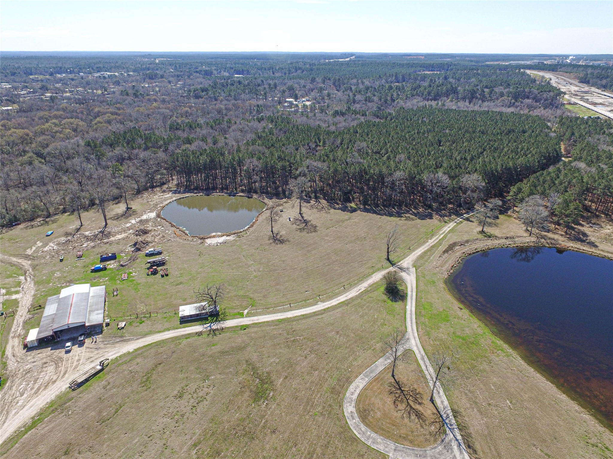 684 Hooks Road Corrigan, TX 75939 - Photo 13 of 34 a view of a swimming pool with a yard