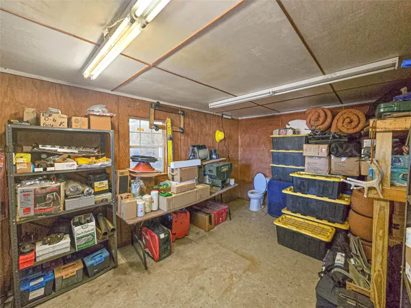 a view of a livingroom with furniture and a chandelier