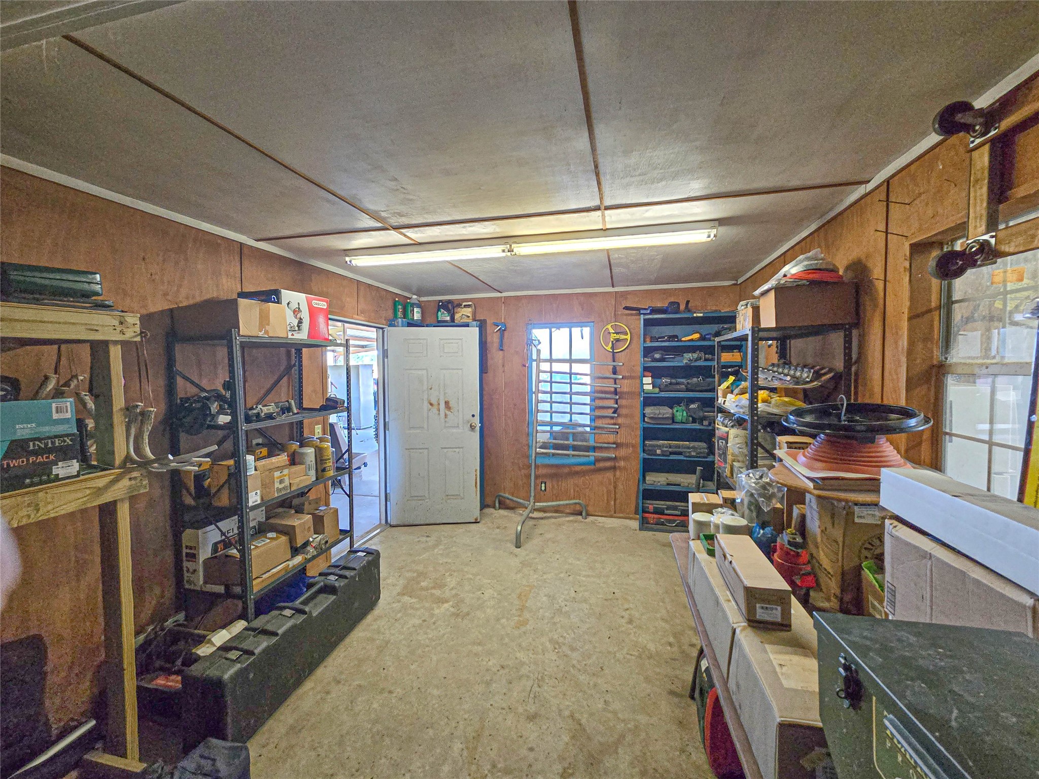 684 Hooks Road Corrigan, TX 75939 - Photo 22 of 34 a view of a room with gym equipment