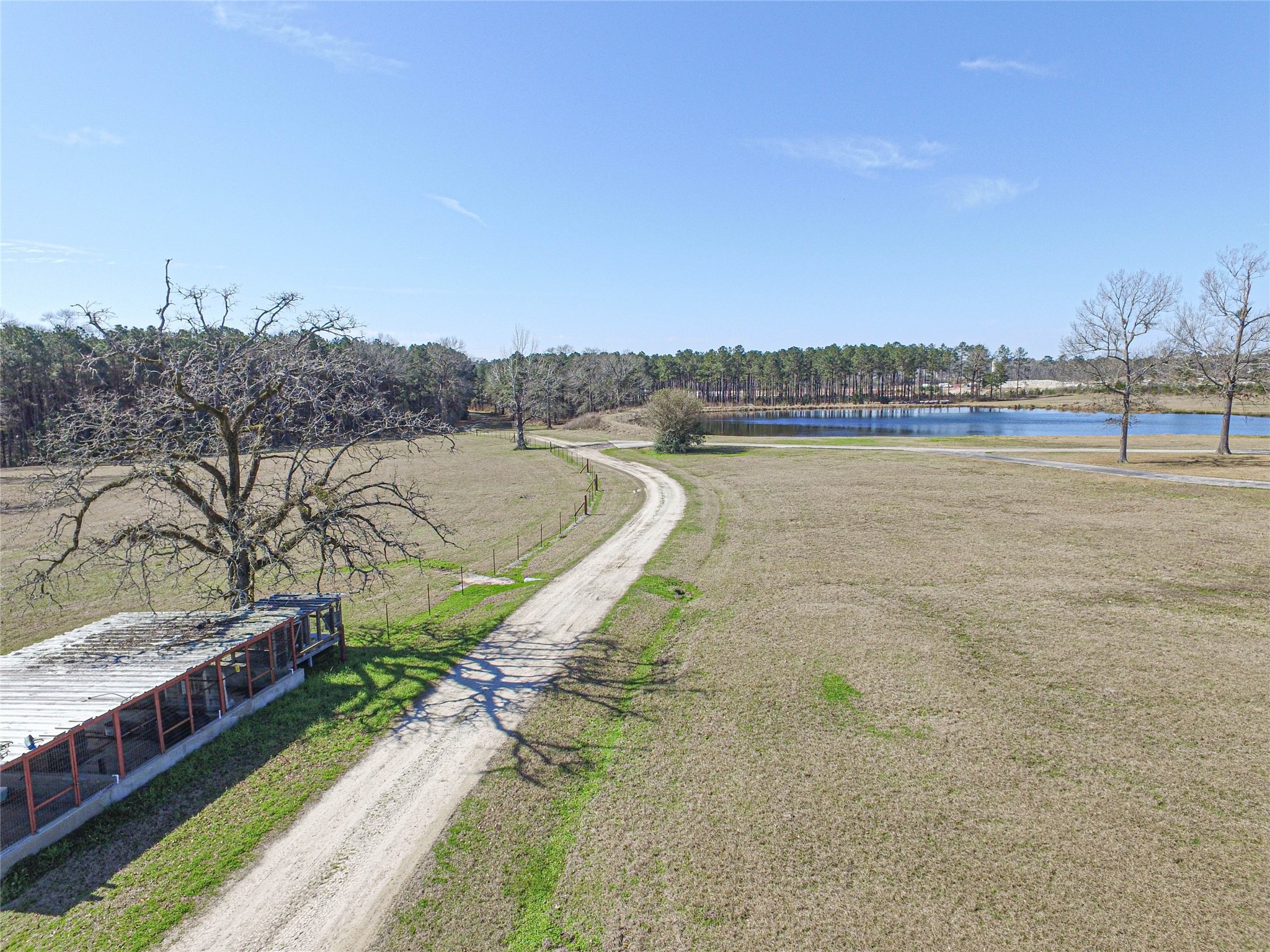 684 Hooks Road Corrigan, TX 75939 - Photo 5 of 34 a view of a lake with a mountain
