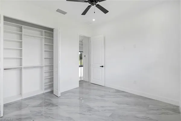 an empty room with closet