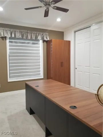 a room with a bed and a window