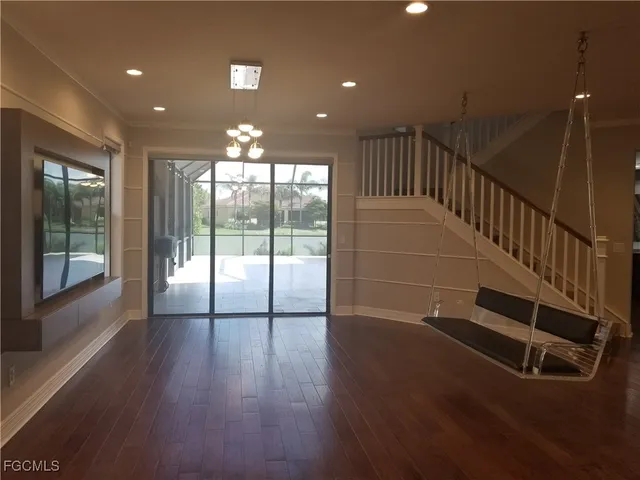 a view of entryway with wooden floor