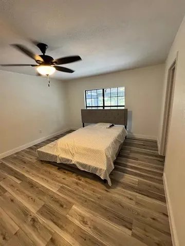 a view of kitchen and dining room with wooden floor