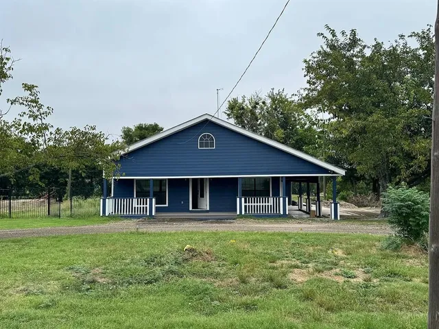 a house view with a garden space