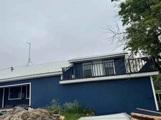 a front view of a house with balcony