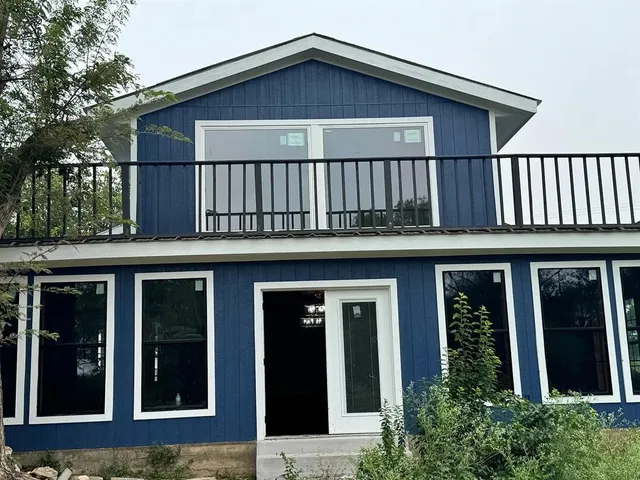 a view of a house with a porch