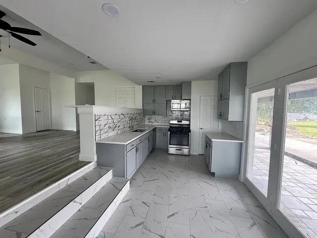 a backyard of a house with lots of green space